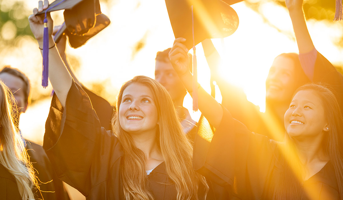 High Schoolers at Graduation - Xact Loans